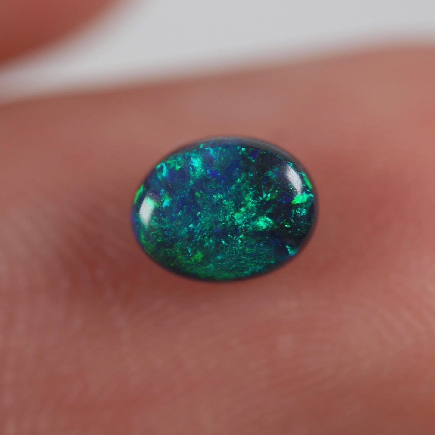 0.48ct (5.5x4.3x3.1mm) Black Opal