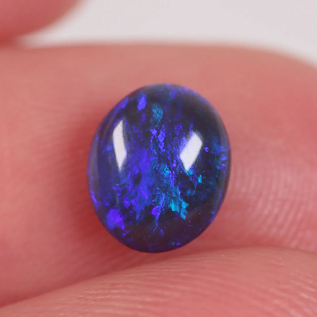 0.84ct (7.2x6x3mm) Black Opal