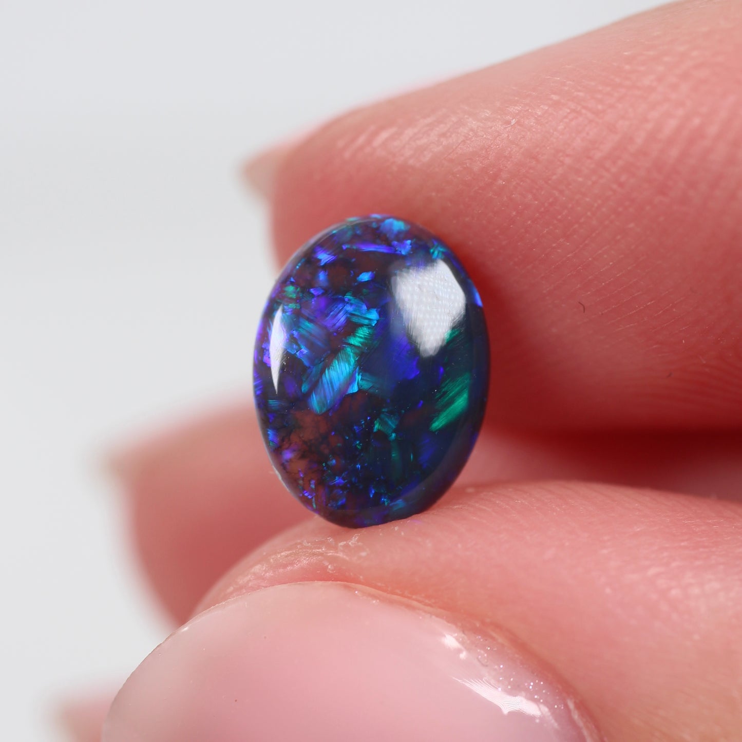1.23cts (9.5x7.2.7mm) Black Opal