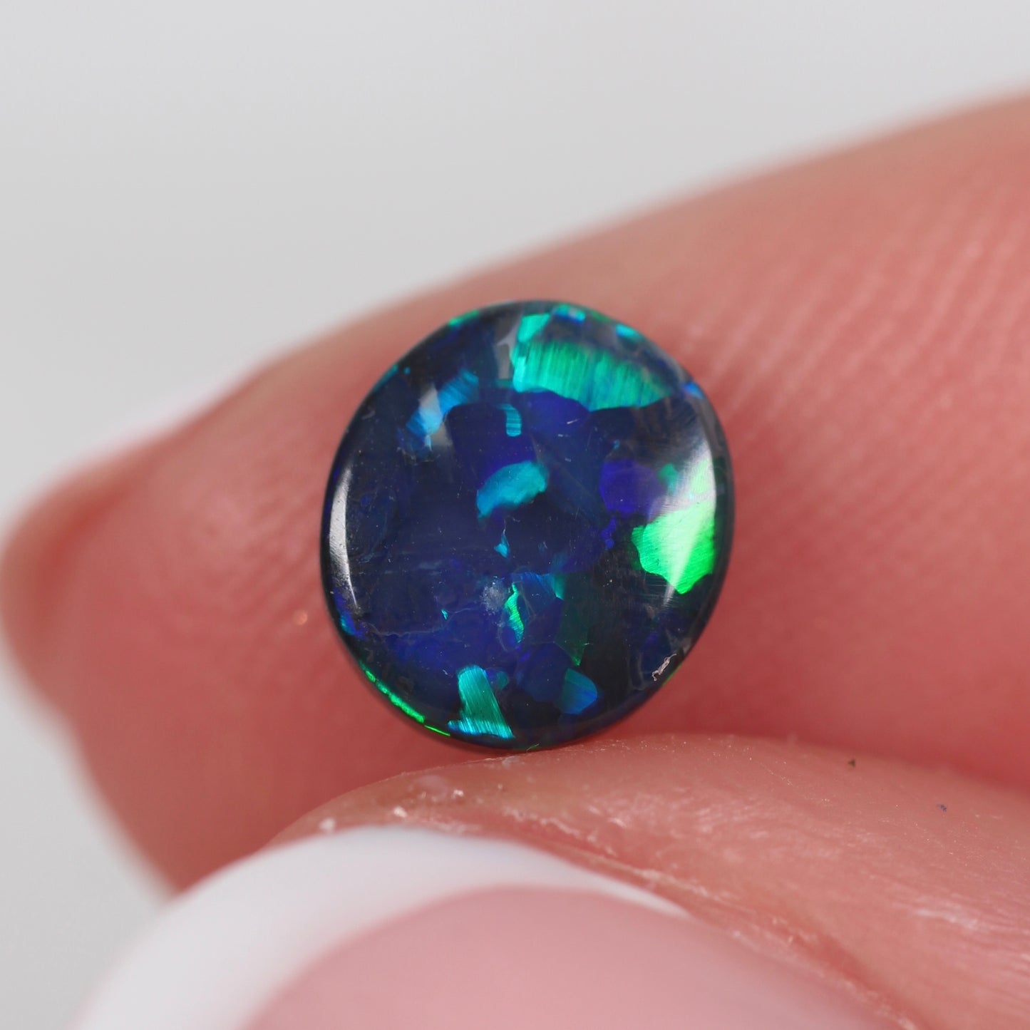 0.74ct (7.4 x 6.7 x 2.2mm) Black Opal