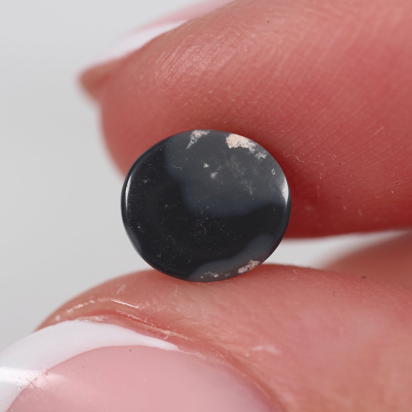 0.74ct (7.4 x 6.7 x 2.2mm) Black Opal