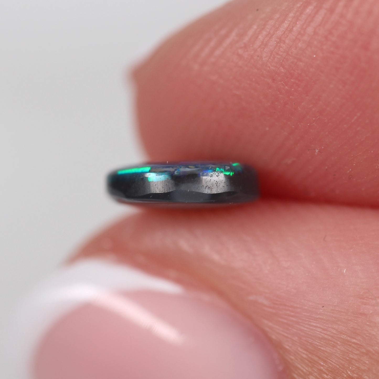 0.74ct (7.4 x 6.7 x 2.2mm) Black Opal