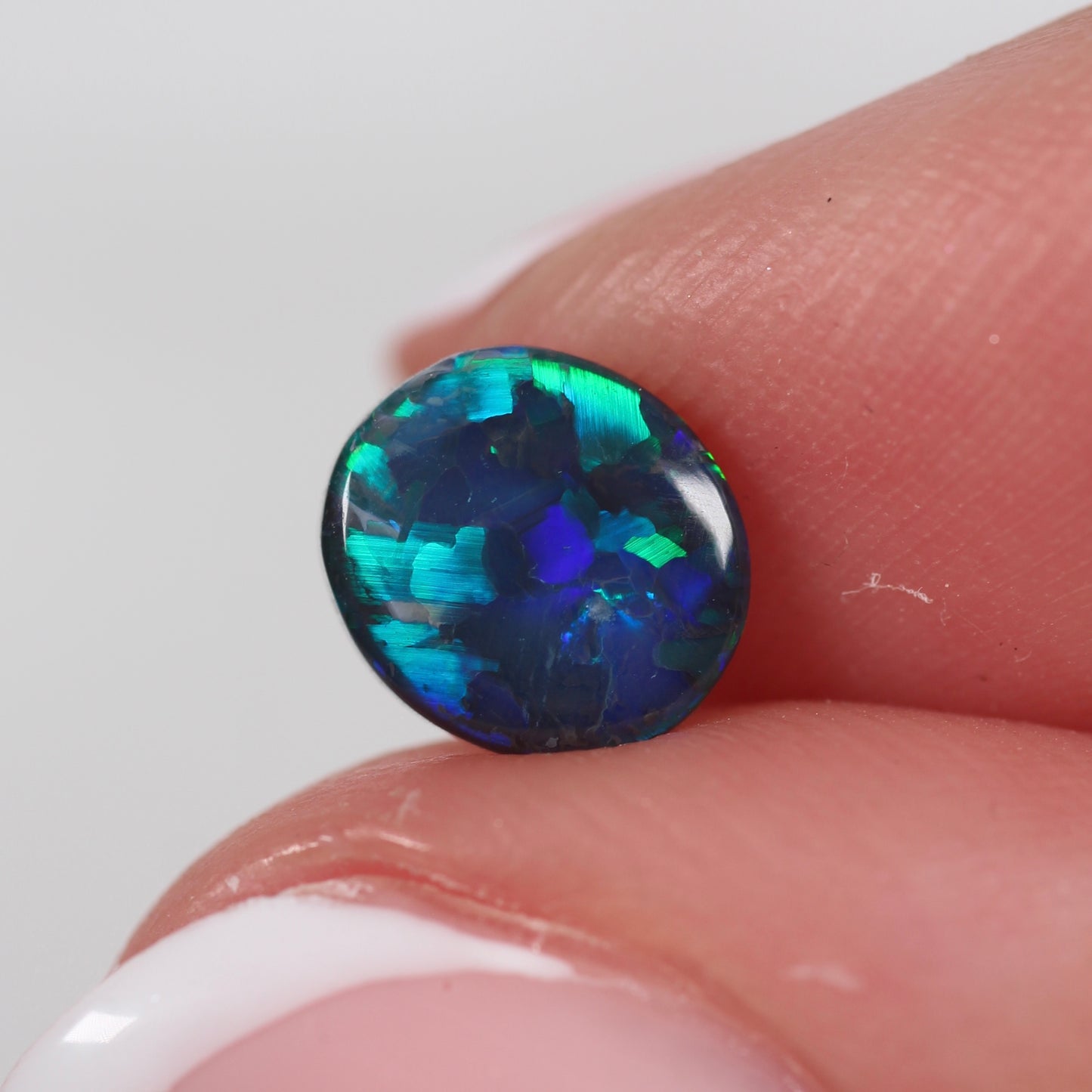 0.74ct (7.4 x 6.7 x 2.2mm) Black Opal