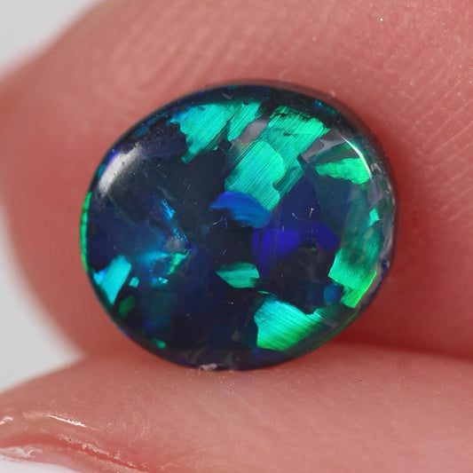 0.74ct (7.4 x 6.7 x 2.2mm) Black Opal